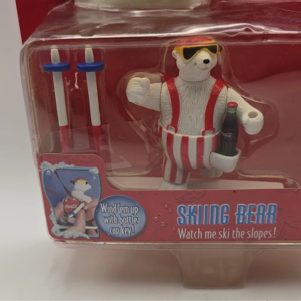 Coca-Cola Polar Crew Wind-Up Skiing Bear w/ Magnetic Skis Bottle Cap Key 1996
